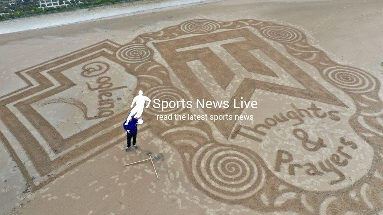 Tiger Woods gets a sand art tribute at St. Andrews