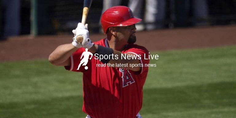 Albert Pujols leaves game after being hit by pitch